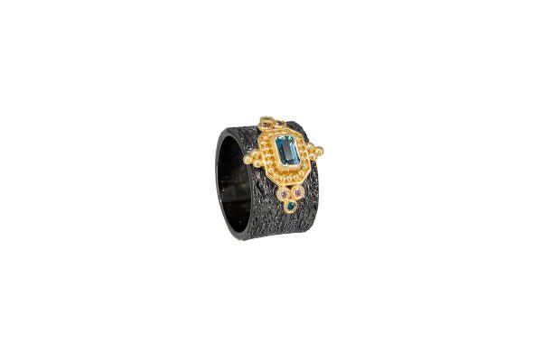 Silver handmade ring with blue topaz 24