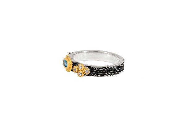 Silver handmade ring with blue topaz 46