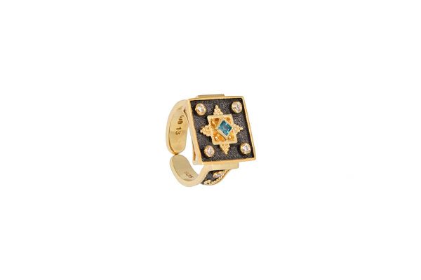 Silver handmade ring with blue topaz 62